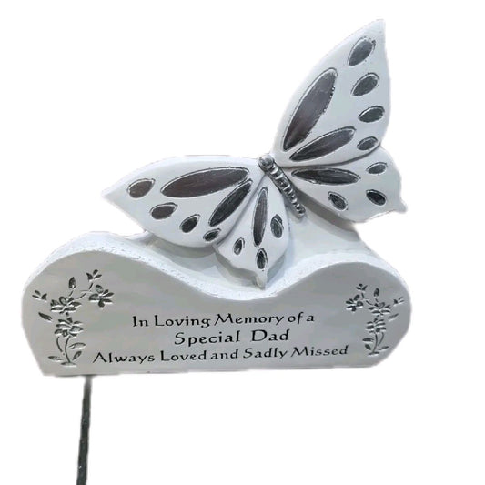 White & Silver Butterfly on a rock Graveside