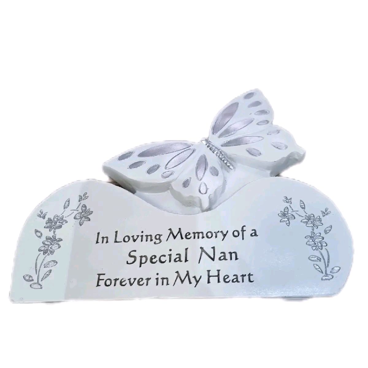 White & Silver Butterfly on a rock Graveside
