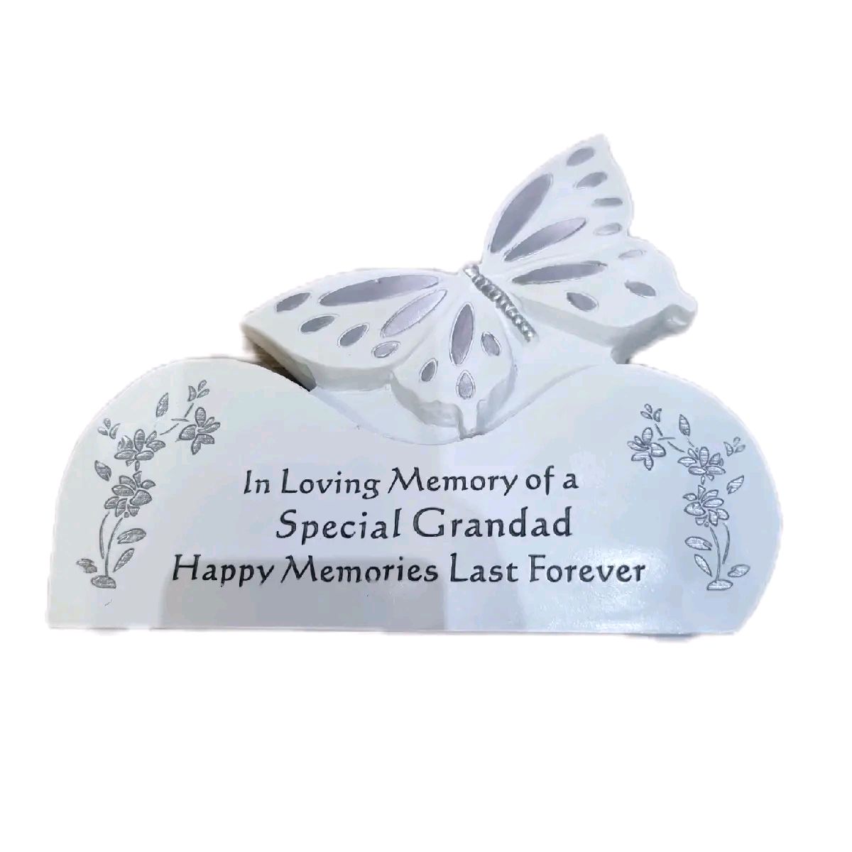 White & Silver Butterfly on a rock Graveside