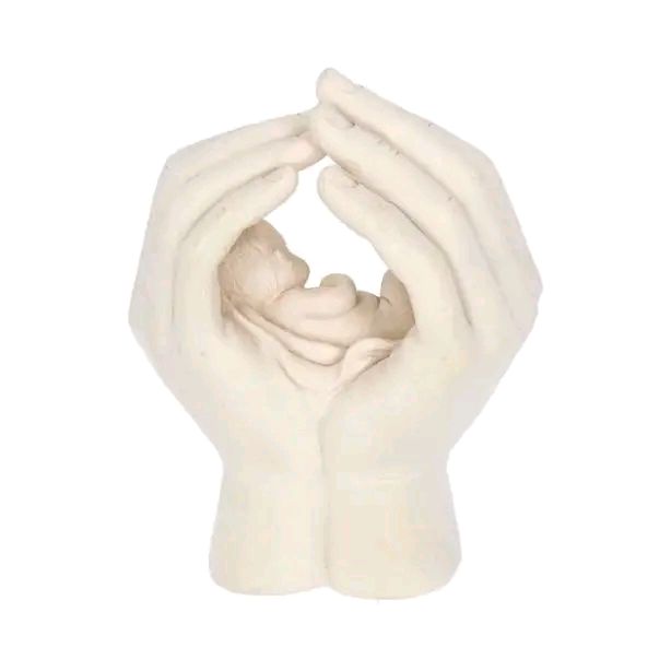 Sleeping Baby Cradled in Hands statue