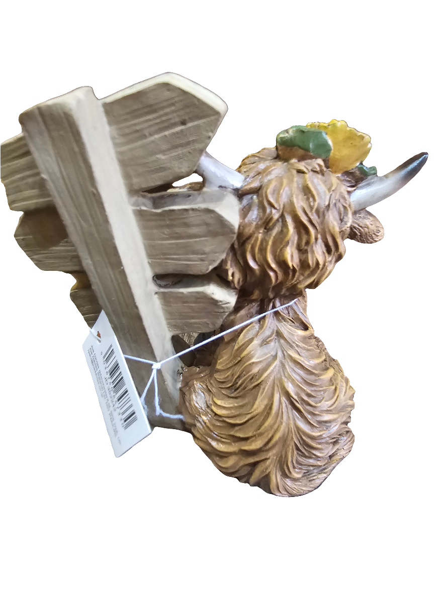 Highland Cow with Autumn Signpost