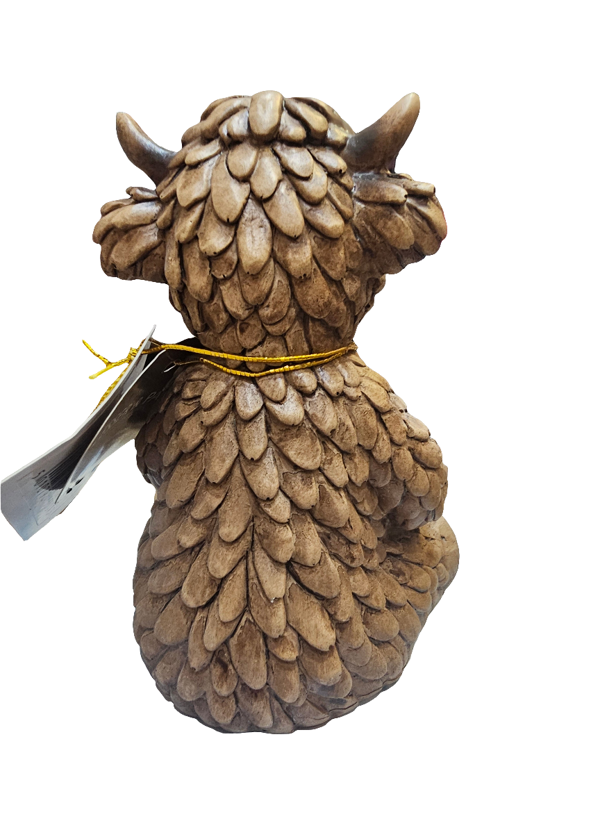 Highland Cow Holding Gold Heart Statue