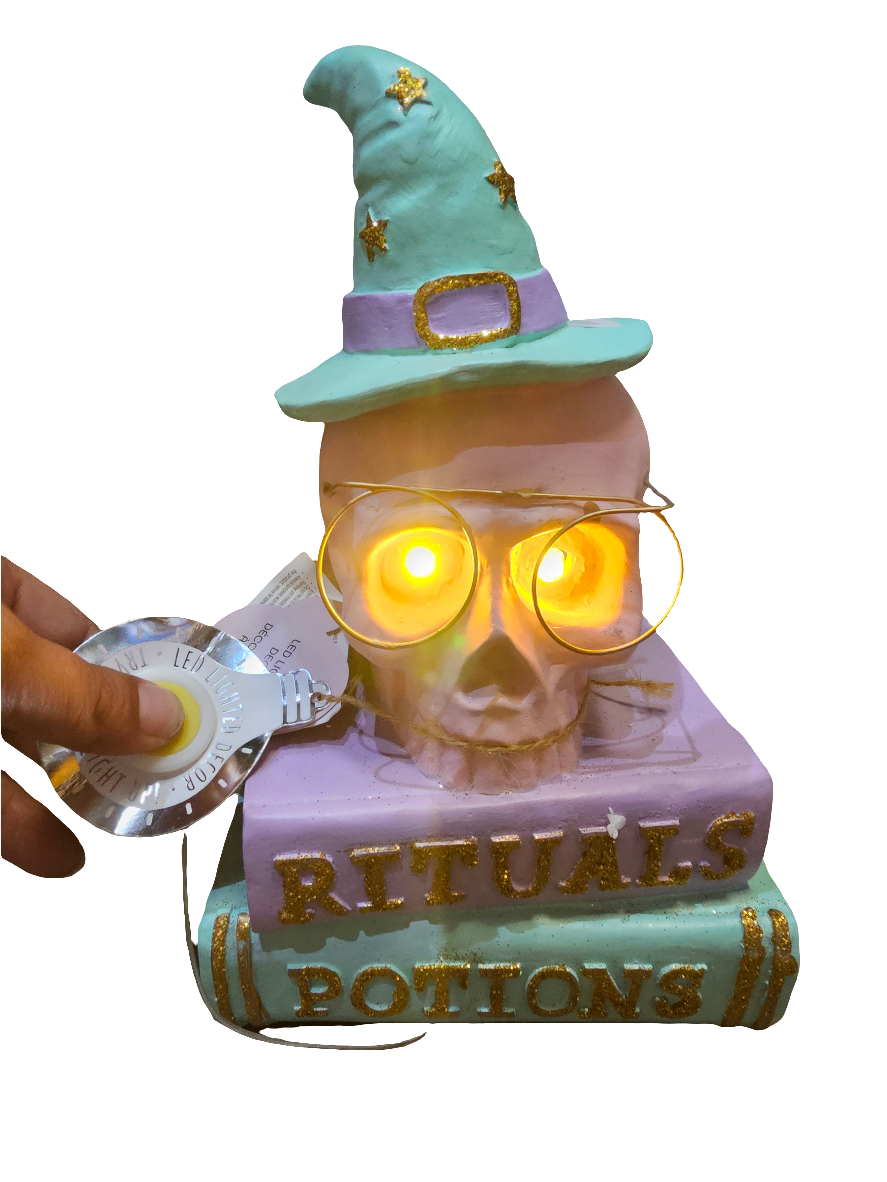 Pastel Skull on Books with Light Up Eyes