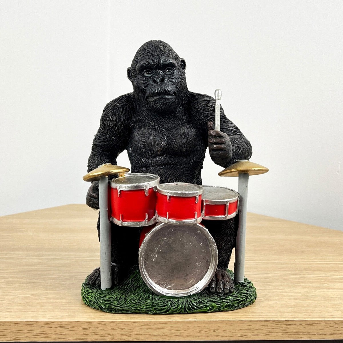 Drumming gorilla music ornament
