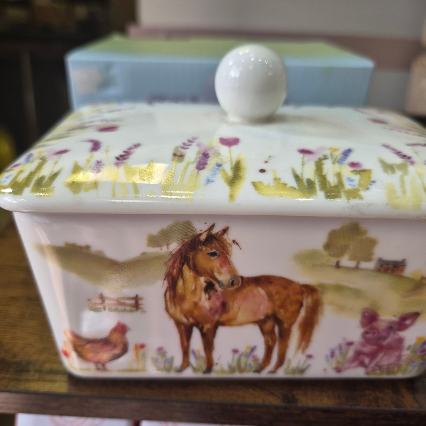 Leonardo Collection fine china butter dish features a charming watercolor farm animal design.
