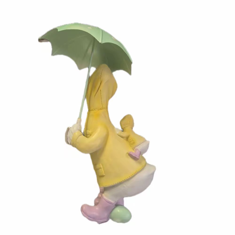 Family of Ducks Under Umbrella