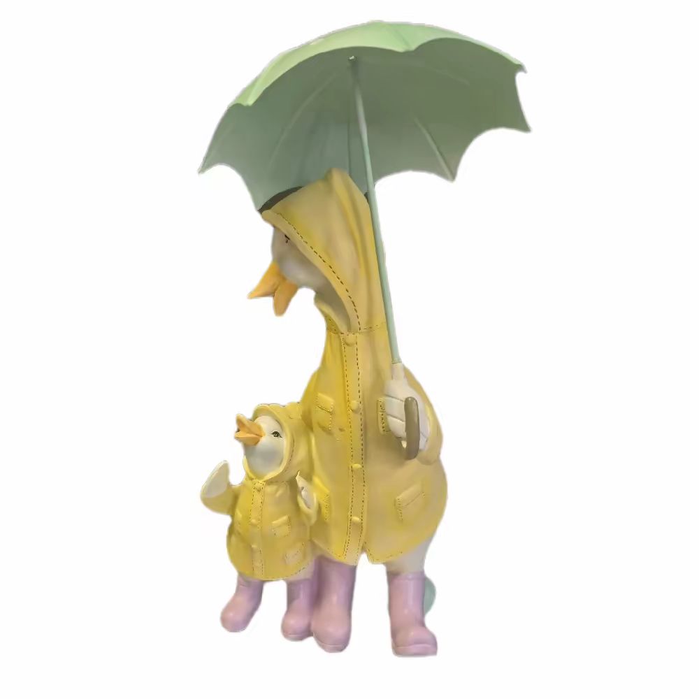 Family of Ducks Under Umbrella