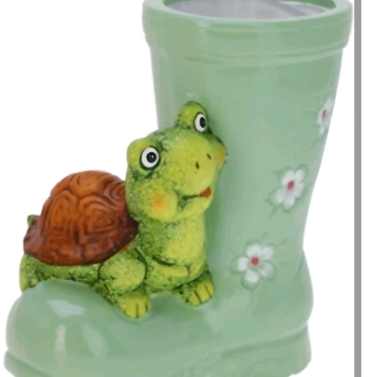 Boot Shaped Flower Pot With Animal Sitting On Top