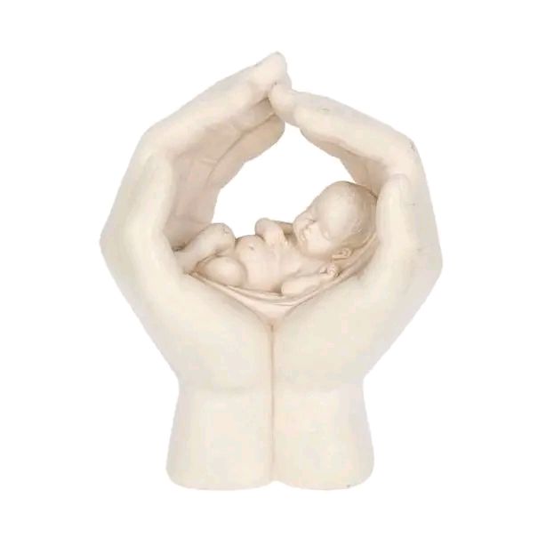 Sleeping Baby Cradled in Hands statue