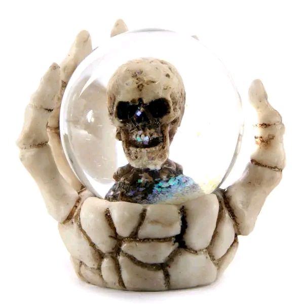 Skull Glitter Globe In Skeleton Hand