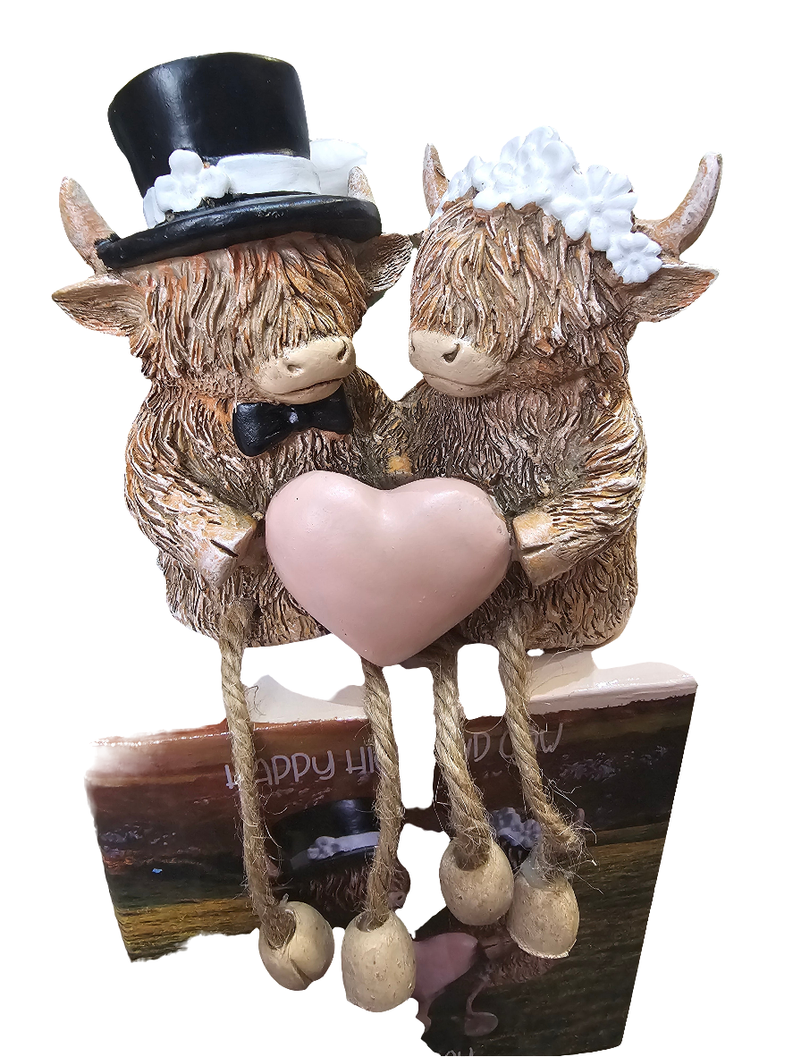 Happy Highland Cow Wedding Day statue with dangling legs