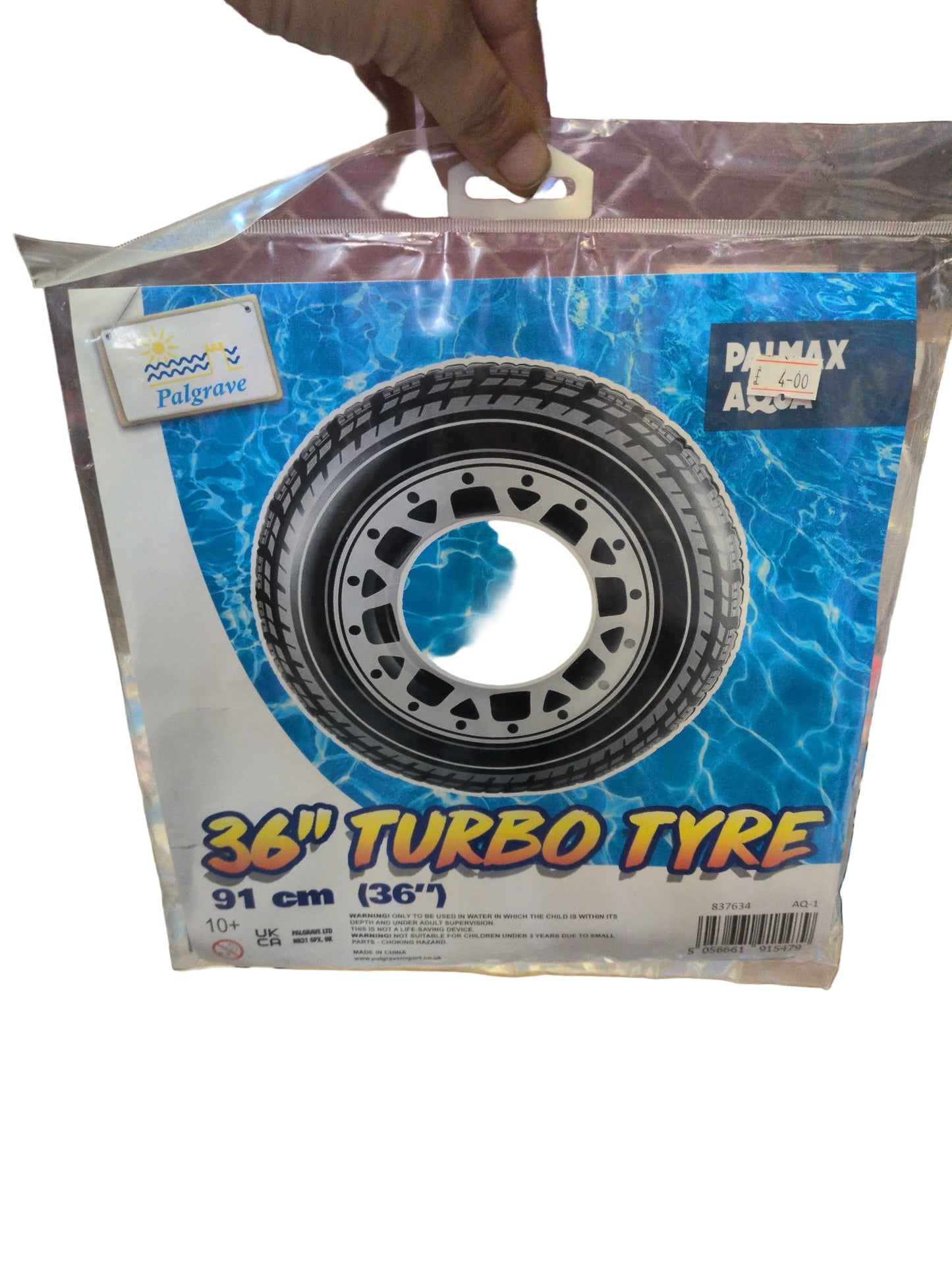 36-inch (91 cm) Turbo Tyre inflatable swimming ring designed for use as a pool float.