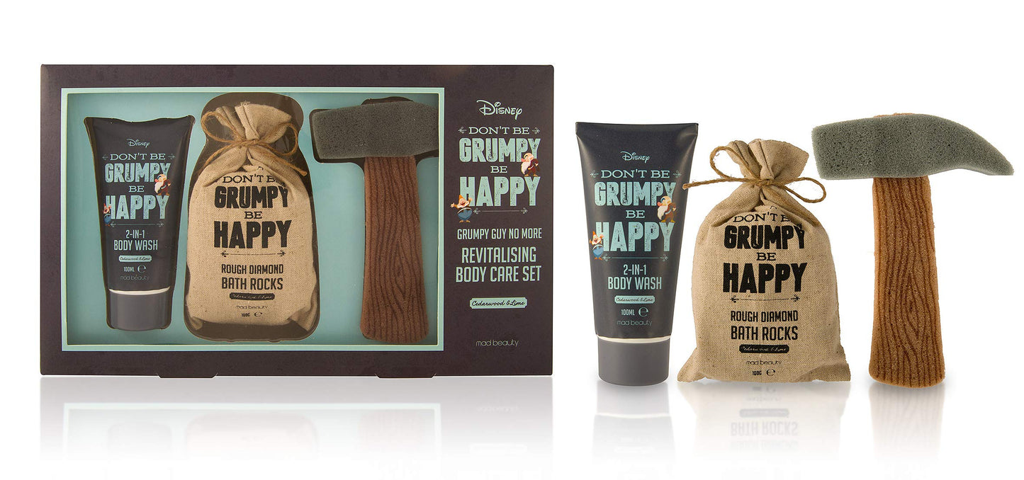 Mad Beauty Disney Grumpy Revitalizing Body Care Set featuring a cedarwood and lime body wash, bath rocks, and a novelty pickaxe-shaped sponge