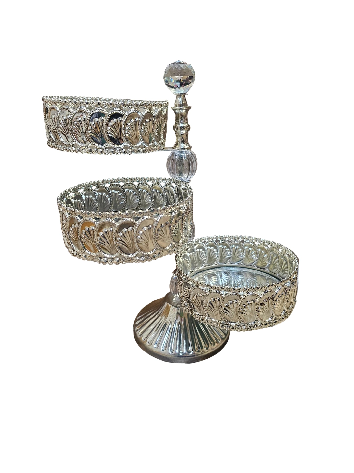 Silver-plated tiered metal cake or candy stand with a mirror top and shell detailing