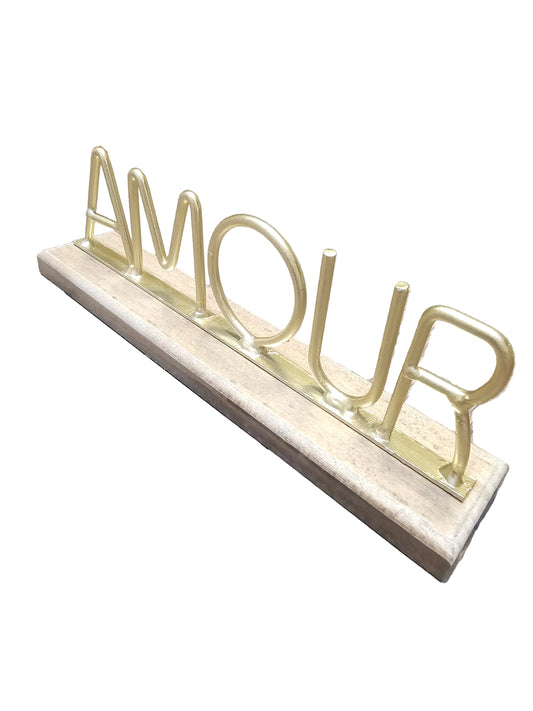 Amour tabletop decor sign with an antique brass finish on a wooden base