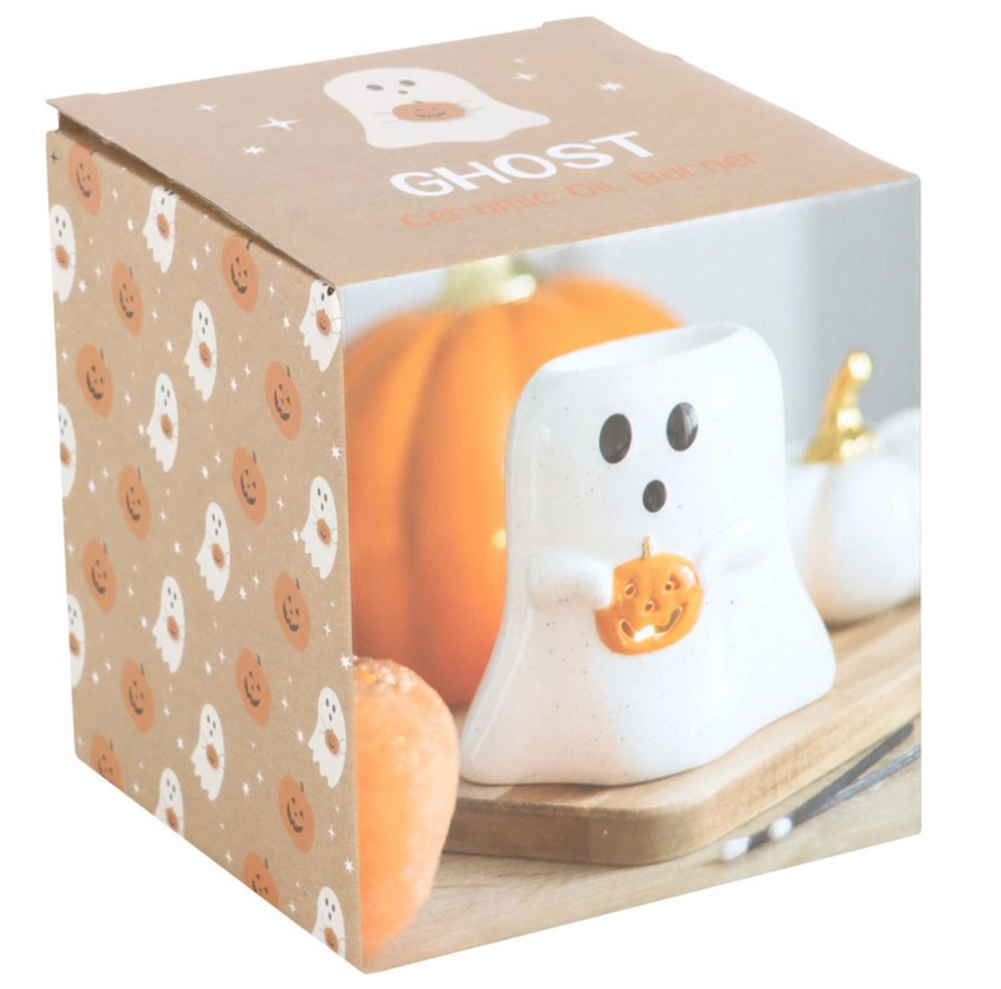 Gloriously Good ghost-shaped wax warmer holds a small orange pumpkin