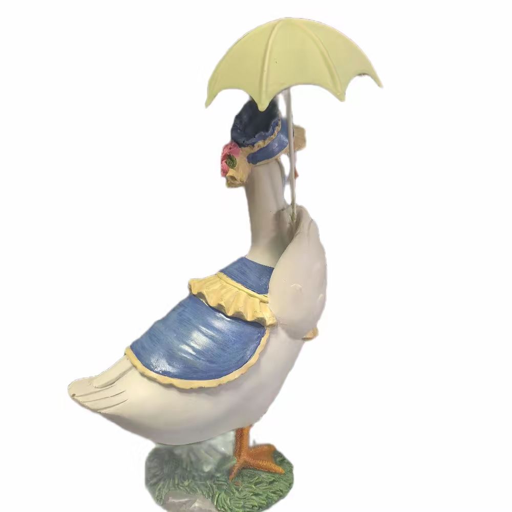 Lady Duck in Bonnet with Umbrella