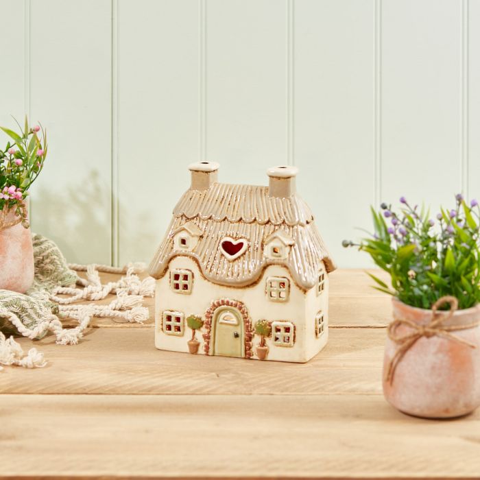 COTTAGE TEALIGHT HOLDER CREAM EMBOSSED STONEWARE WITH TREES