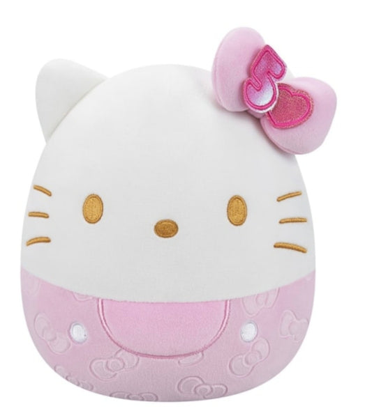 This Squishmallows Hello Kitty 50th Anniversary plush features a distinctive pink embossed design and metallic gold facial details.